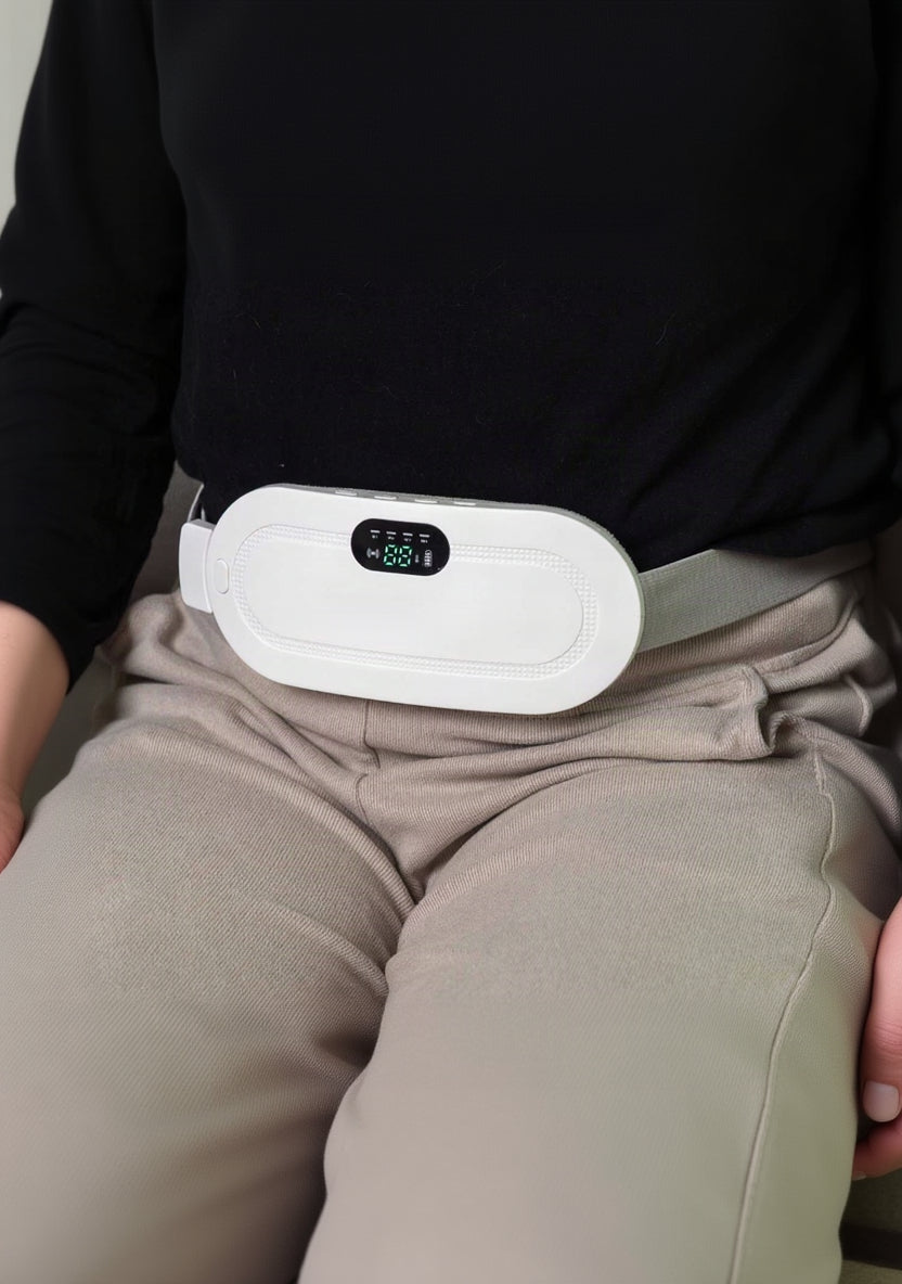 CrampCalm Aura wearable heating belt in white